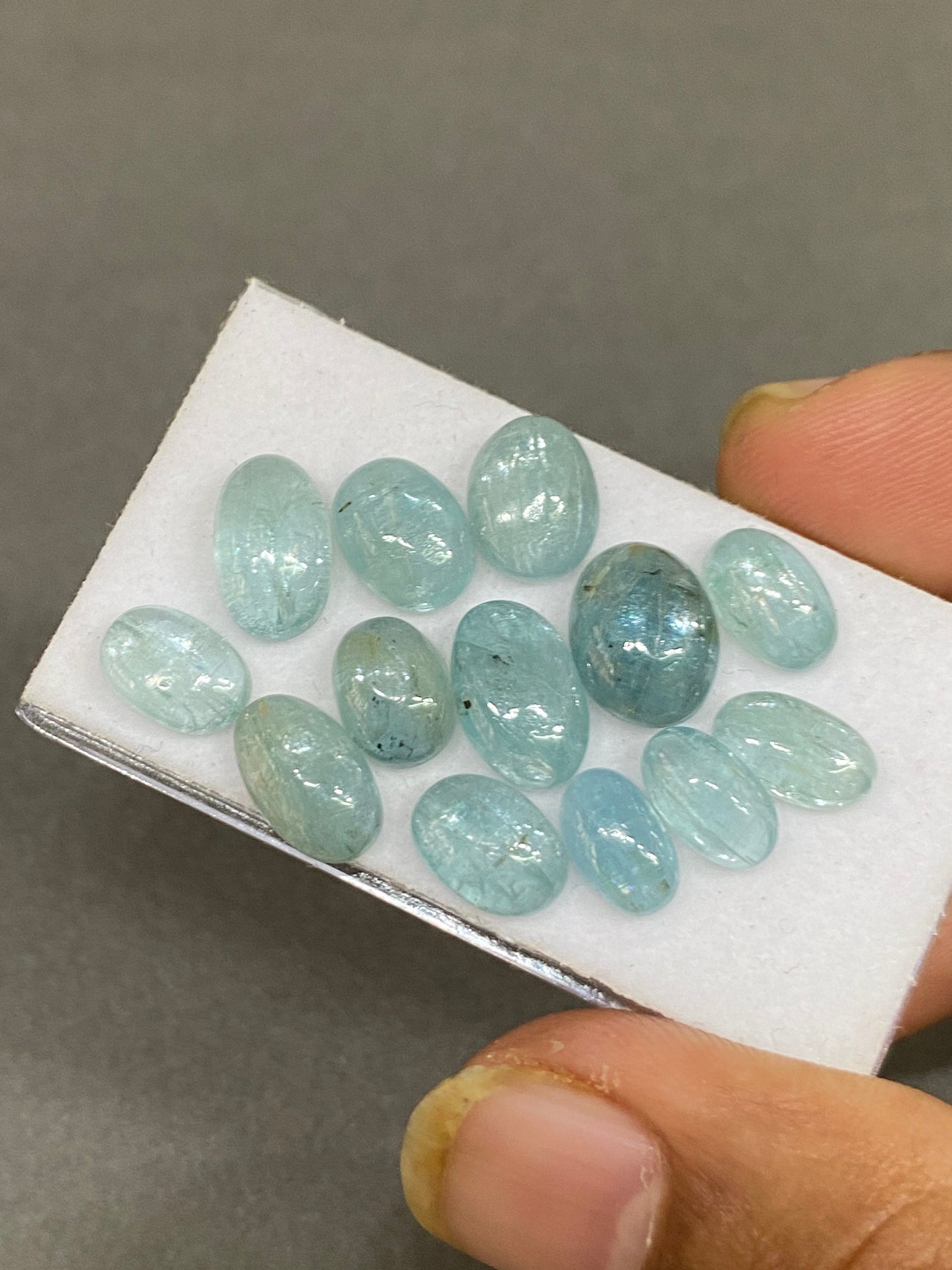 Vivacious rare aqua blue  oval cabochons fine quality wt  34 cts size 9x6mm-11x7mm  pcs 13 aqua kyanite oval smooth cabs