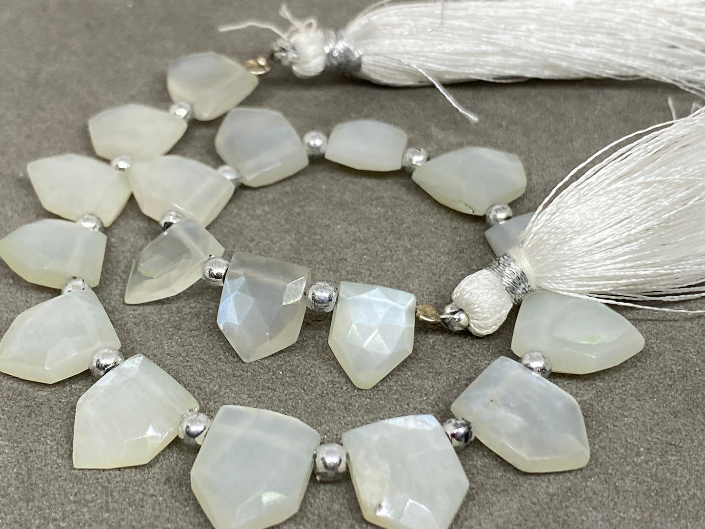 Wow white moonstone faceted pentagon hut briolette 8 inches wt 54 cts  pcs 18 size 9x7mm-12x9mm faceted moonstone hut briolette