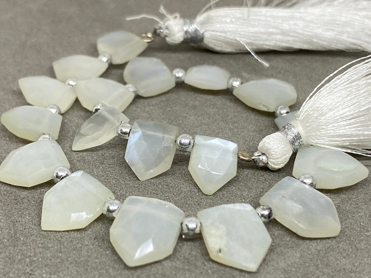 Wow white moonstone faceted pentagon hut briolette 8 inches wt 54 cts  pcs 18 size 9x7mm-12x9mm faceted moonstone hut briolette