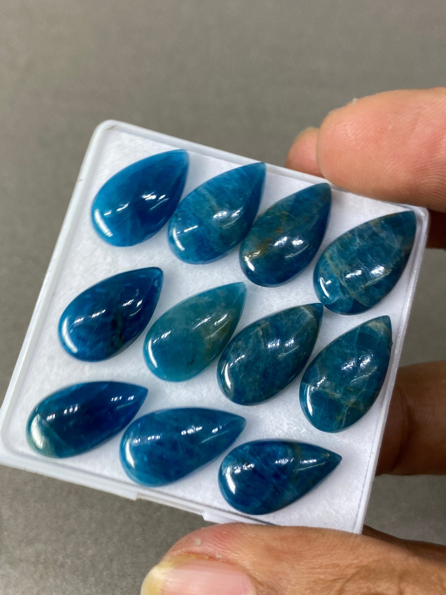 Neon blue apatite flat cabochons pears wholesale lot pcs 11 weight 60 carats size 16x9mm-19x10mm blue apatite cabochons