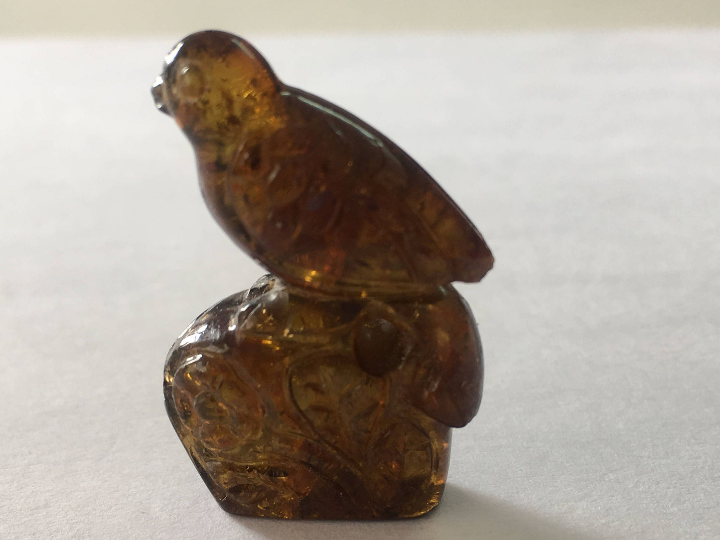 Rare Hessonite garnet bird carving weight 54.5 carats size 34x21mm