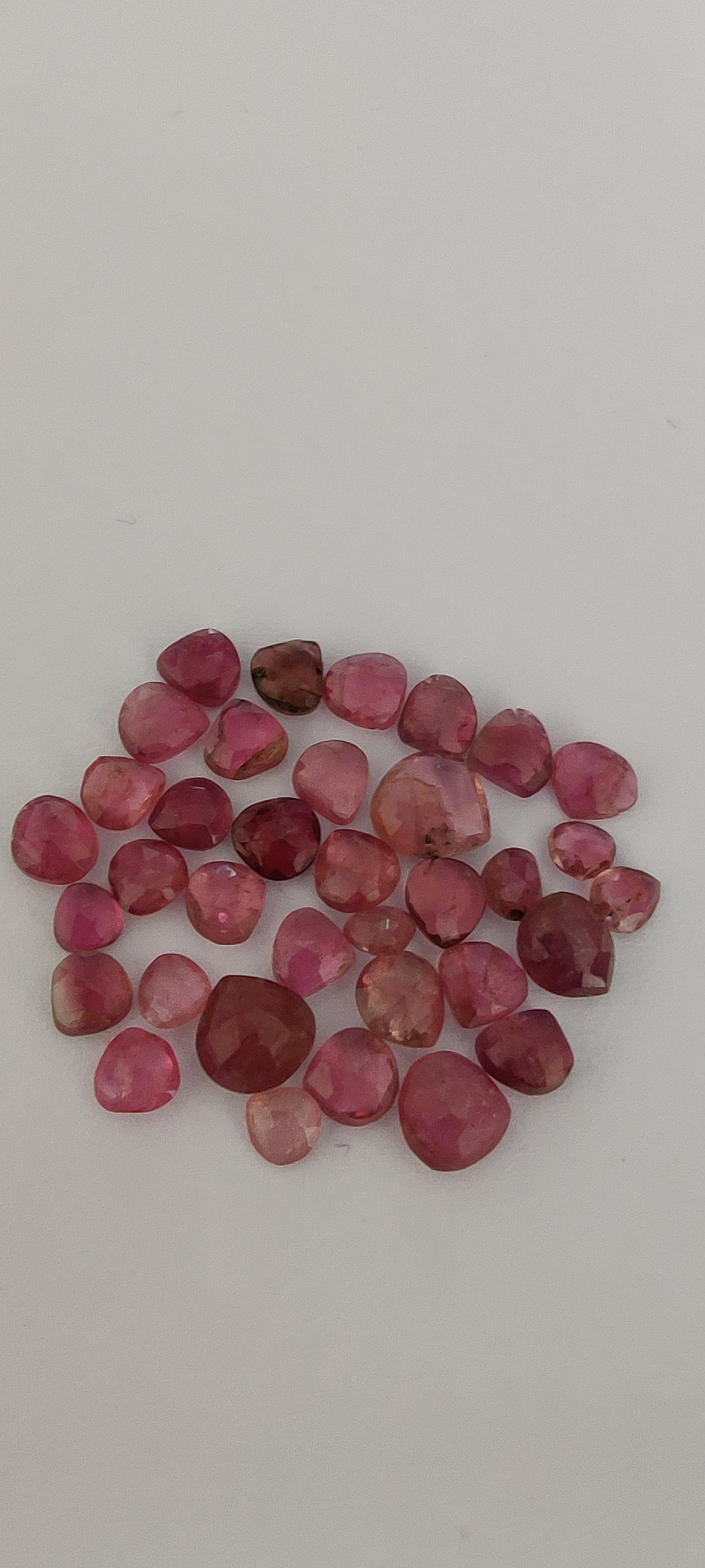 Pink tourmaline very small size faceted heart briolettes undrilled pcs 36 wt 15.50 carats size 4x3.8-6mm pink tourmaline heart briolettes