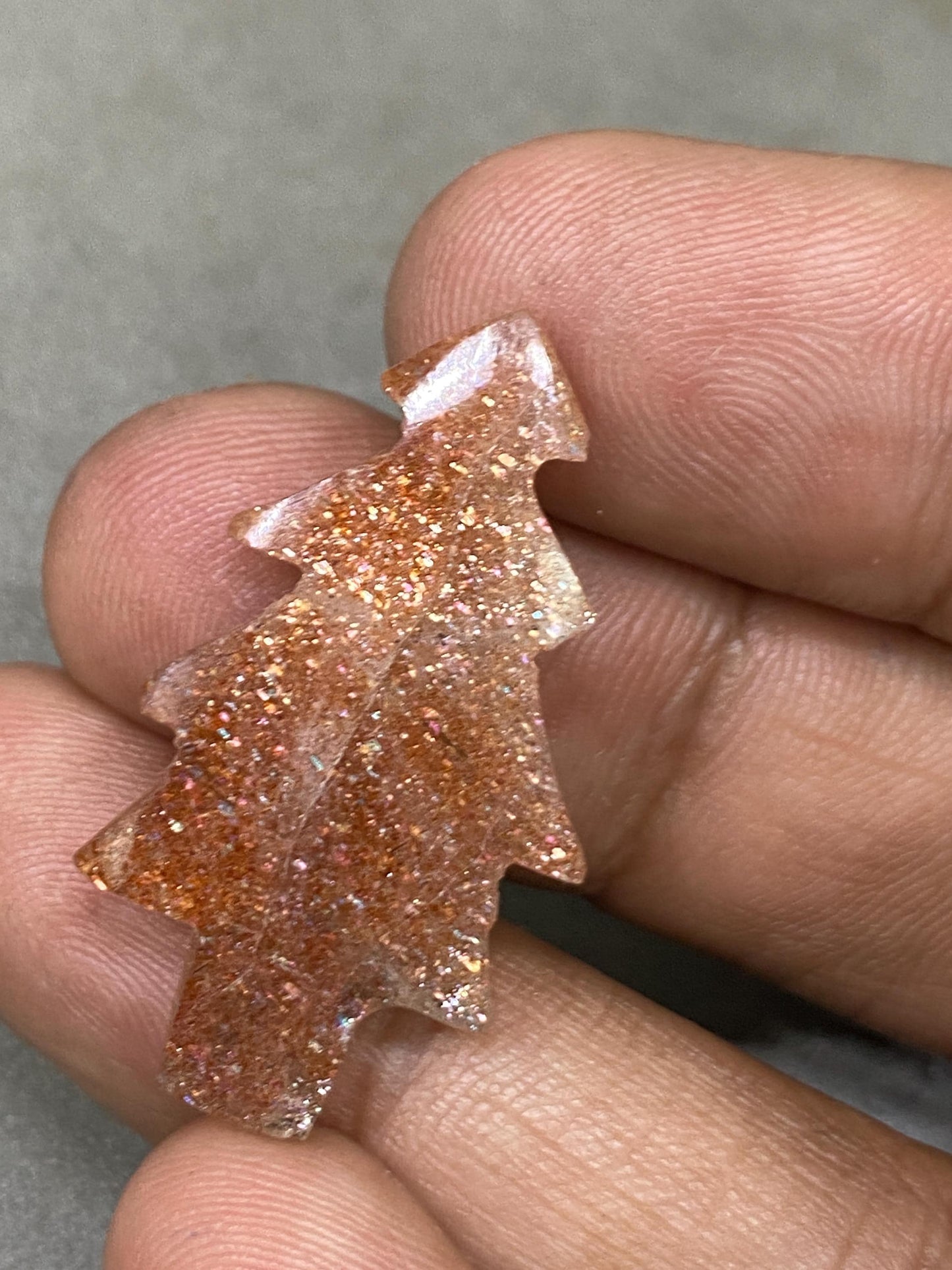 Stunning Confetti Sunstone christmas tree shape carving  pcs 1 wt 19.10 cts size 35x18mm Sunstone Christmas tree carving