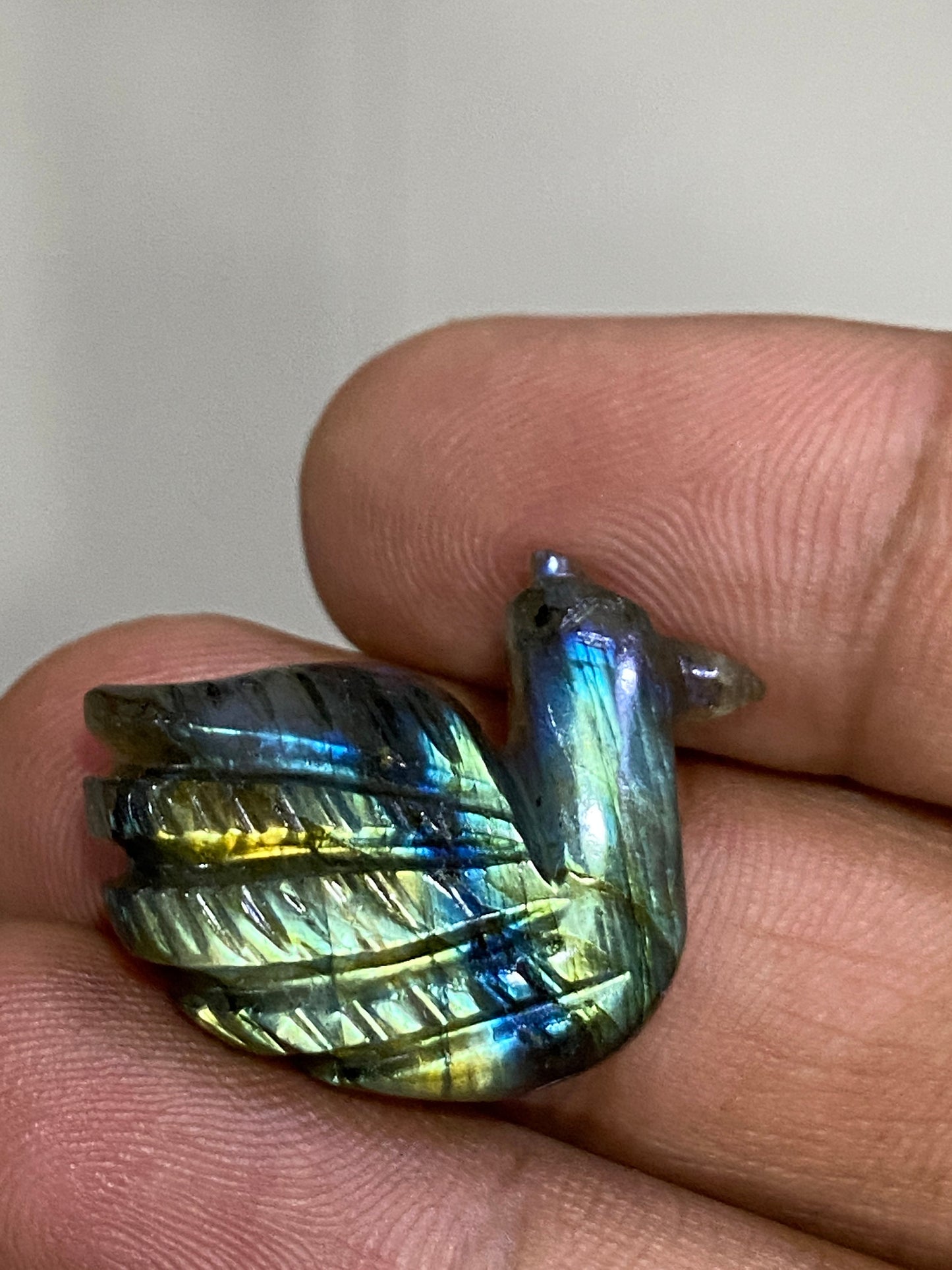 Fascinating blue green Fire duck Labradorite carving labradorite blue green fire duck carving wt 27 cts size 27x21mm gemstone carving