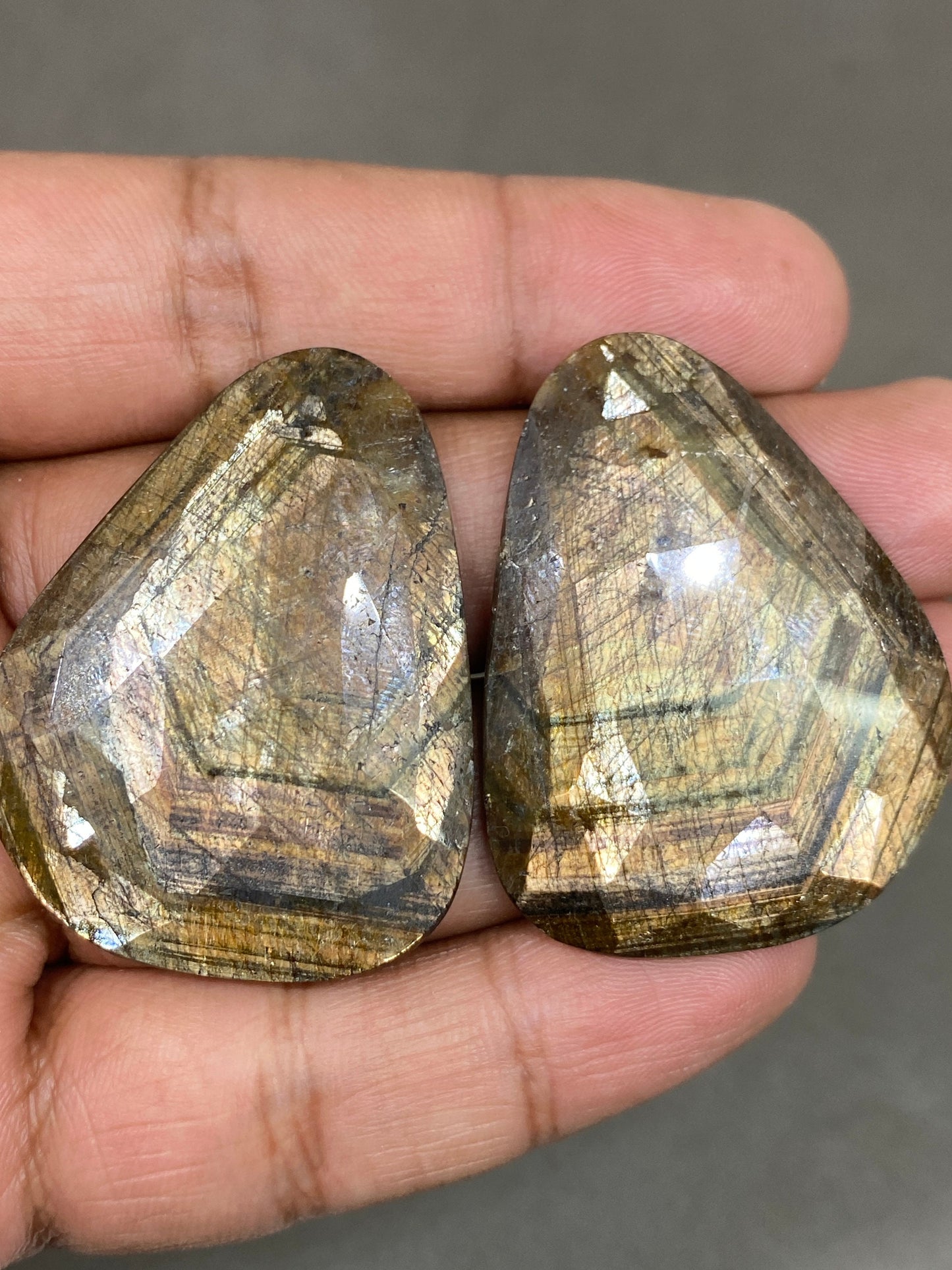 Extremely rare huge fancy shape golden sheen sapphires matched pair weight 164 cts size 43x35-45x35mm gold sheen sapphire rosecut pair