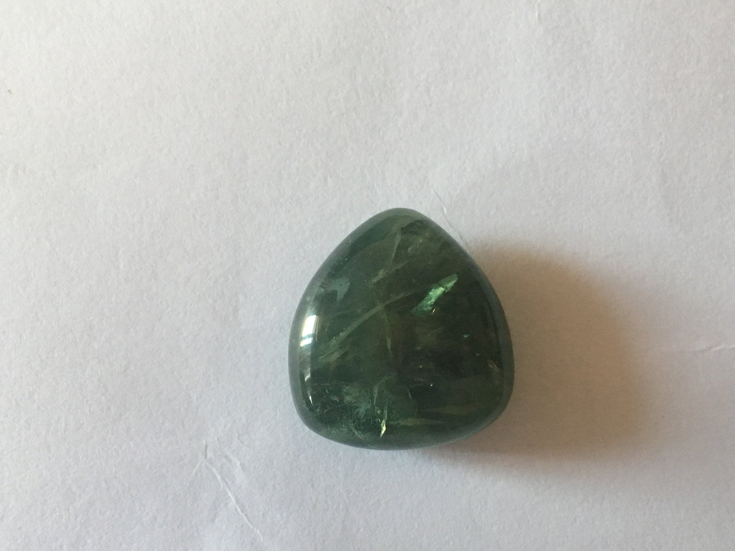 Very beautiful Extremely rare green sapphire big crack in the center 65 carats  umba sapphire smooth polished heart cabochon electric color