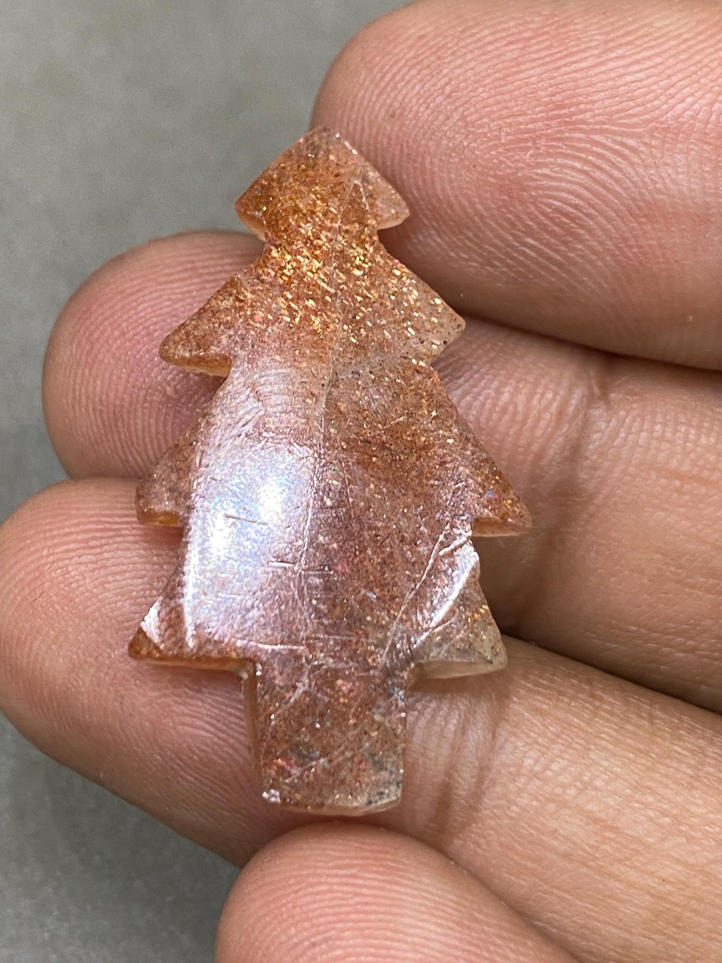 Stunning Confetti Sunstone christmas tree shape carving  pcs 1 wt 19.10 cts size 35x18mm Sunstone Christmas tree carving